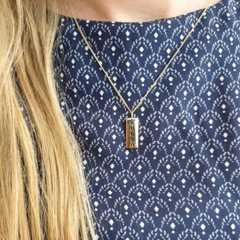 Kulla mellan 18 karat